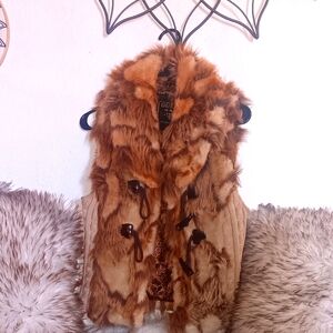 Luxurious Guess multi-colored fawn fur vest. Size M.